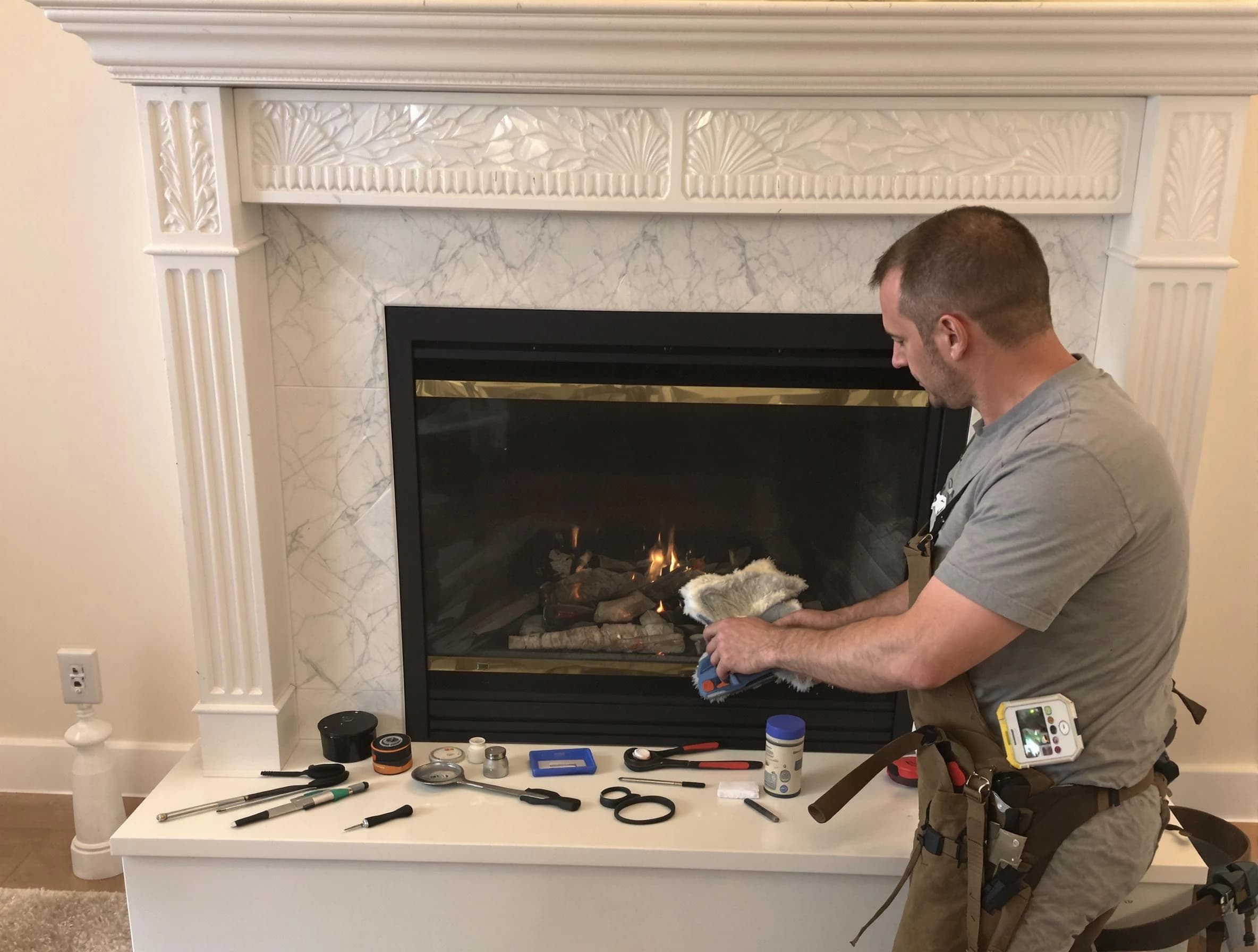 Perry Chimney Sweep performing fireplace maintenance in Perry, UT